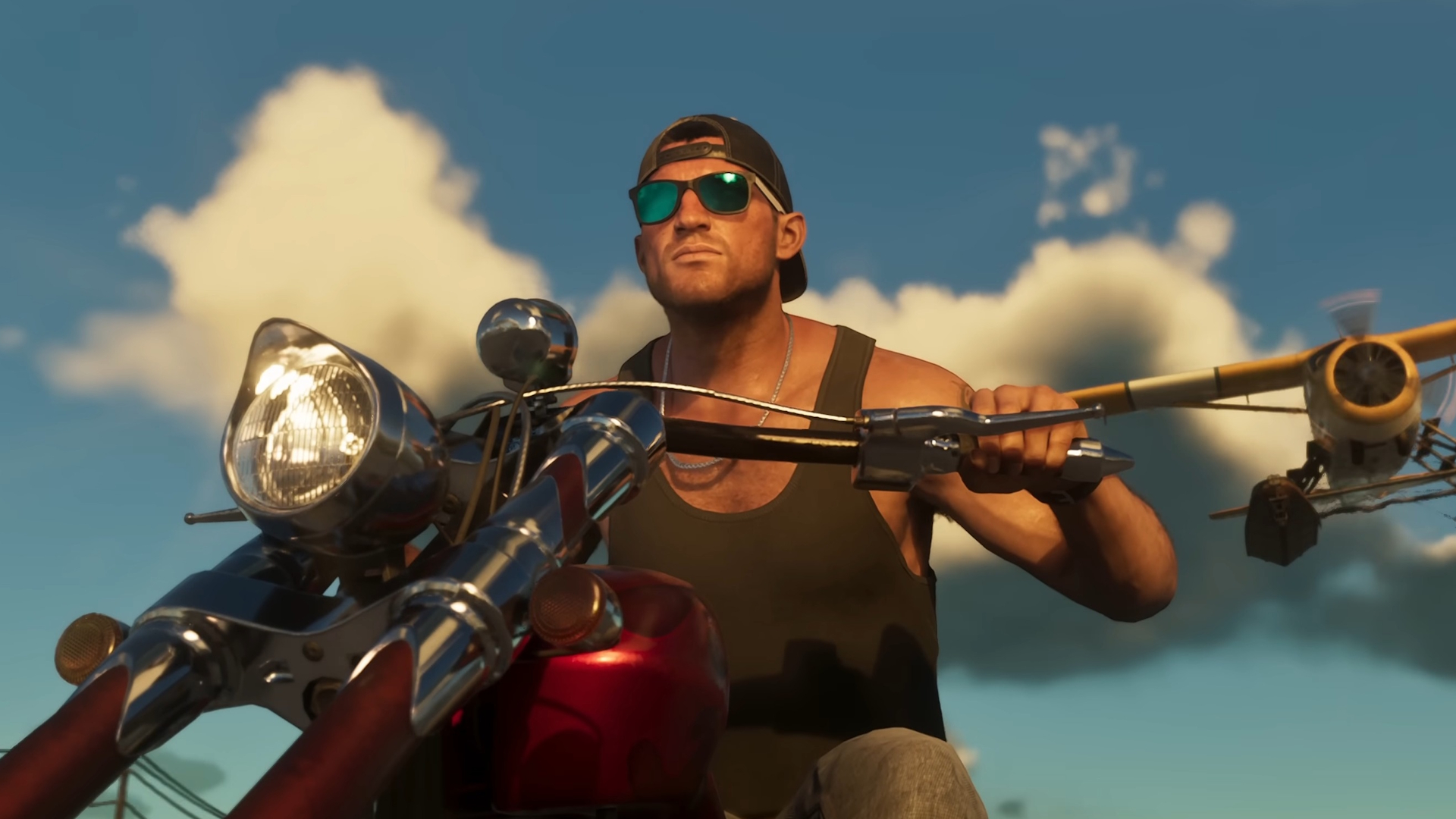 Jason riding a motorcycle under a bright sky